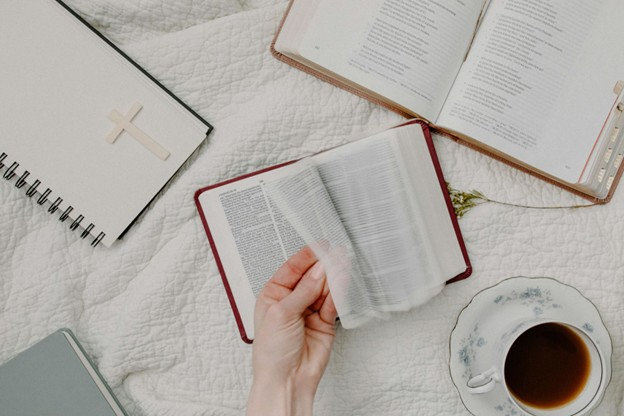 hand-opening-bible