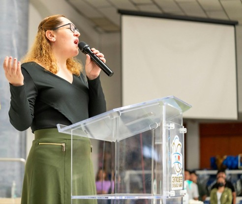 Woman at Podium