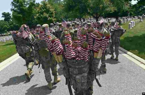 Soldiers with Memorial Day Flags